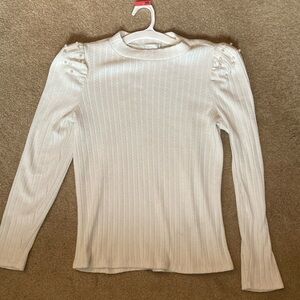 White ribbed fitted blouse with mock neck and puff sleeves